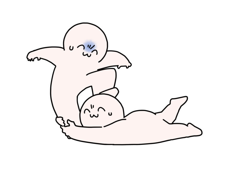 足にしがみつく人