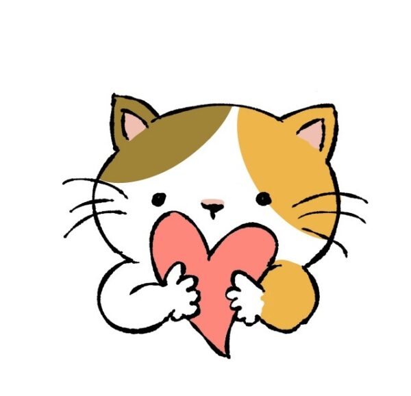 ピンクのハートを持つねこ