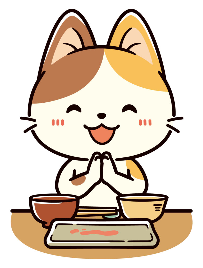 手を合わせてご馳走様をする可愛い三毛猫