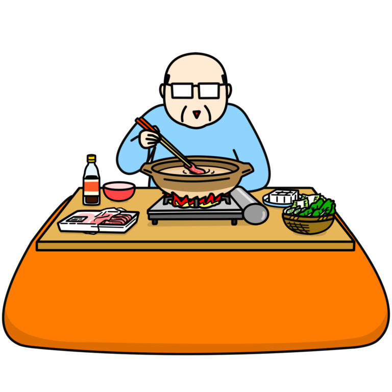 こたつで鍋を食べる男性