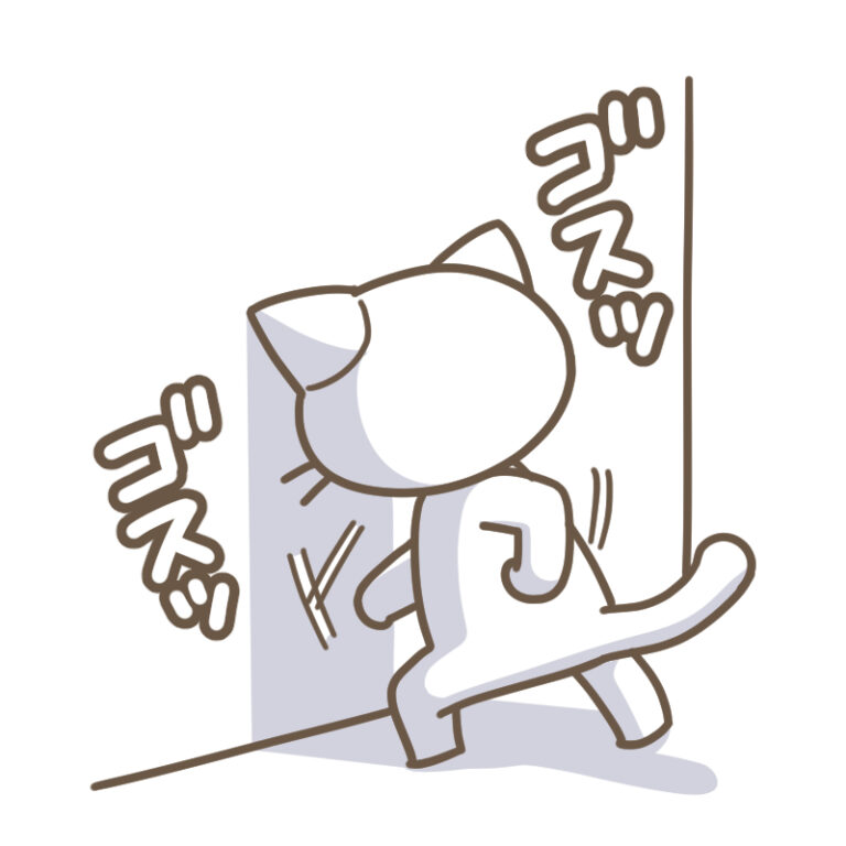 壁を殴る猫